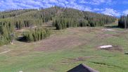 Archived webcam image showing Winter Park Eskimo Chairlift and Snoasis Restaurant on 12 Jun 2026 at 02:34