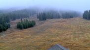 Archived webcam image showing Winter Park Eskimo Chairlift and Snoasis Restaurant on 13 Oct 2026 at 18:54