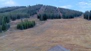 Archived webcam image showing Winter Park Eskimo Chairlift and Snoasis Restaurant on 25 Oct 2026 at 14:21