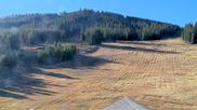 Archived webcam image showing Winter Park Eskimo Chairlift and Snoasis Restaurant on 25 Oct 2026 at 16:21