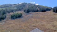 Archived webcam image showing Winter Park Eskimo Chairlift and Snoasis Restaurant on 25 Oct 2026 at 18:21