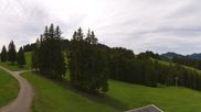 Archived webcam image showing top station gondola Ossi-Reichert on 4 Jun 2026 at 12:09