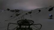Archived webcam image showing La Plagne - Top station of chairlift Bijolin on 13 Apr 2026 at 04:57