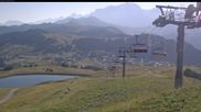 Archiviertes Webcam Bild: Les Saisies - Bergstation Sessellift Bisanne am 12.07.2026 um 08:48 Uhr
