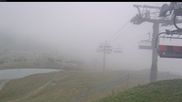 Archiviertes Webcam Bild: Les Saisies - Bergstation Sessellift Bisanne am 11.10.2026 um 08:14 Uhr
