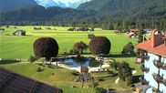 Archived webcam image showing Oberstdorf meadows on 12 Jul 2026 at 08:21