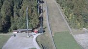 Archived webcam image showing Heini-Klopfer Ski-jumping hill on 6 Oct 2026 at 12:52