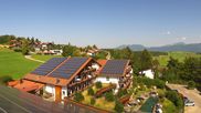 Archived webcam image showing Hopfensee - View to Reutte-Hahnenkamm ski resort on 30 Jul 2026 at 16:09