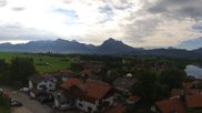 Archiviertes Webcam Bild: Hopfensee - Blick Richtung Skigebiet Reutte-Hahnenkamm am 26.08.2026 um 10:07 Uhr
