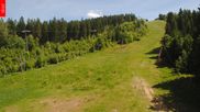 Archived webcam image showing Tanvaldsky Spicak - Slope Slalomák on 28 May 2026 at 14:12