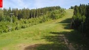 Archived webcam image showing Tanvaldsky Spicak - Slope Slalomák on 28 May 2026 at 16:12