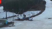 Archived webcam image showing Tanvaldsky Spicak - Top station on 28 Mar 2026 at 06:45