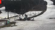 Archived webcam image showing Tanvaldsky Spicak - Top station on 28 Mar 2026 at 14:45