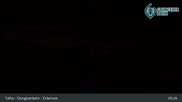 Archived webcam image showing View Glungezer: Lake Zirbensee on 4 Oct 2026 at 05:11