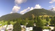 Archived webcam image showing Rittisberg - Kids area Kaliland and Ramsau Beach on 12 Aug 2026 at 10:58