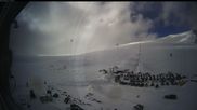 Archived webcam image showing Summerskicenter Galdhoppingen - Base Station on 15 May 2026 at 12:31