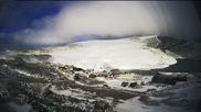 Archived webcam image showing Summerskicenter Galdhoppingen - Base Station on 21 Sep 2026 at 08:21
