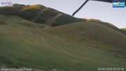 Archived webcam image showing Campo Felice - rope lift Baby Campo Felice, slope Scorpione and chairlift Nibbio on 26 Aug 2026 at 06:32