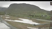 Archived webcam image showing Myrkdalen at the main ticket office Myrkdalsstovo on 22 May 2026 at 12:57