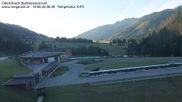 Archived webcam image showing Obertilliach biathlon centre on 14 Jun 2026 at 06:55