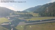 Archived webcam image showing Obertilliach biathlon centre on 14 Jun 2026 at 07:55