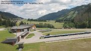 Archived webcam image showing Obertilliach biathlon centre on 14 Jun 2026 at 14:55