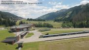 Archived webcam image showing Obertilliach biathlon centre on 14 Jun 2026 at 12:55
