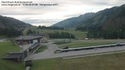 Archived webcam image showing Obertilliach biathlon centre on 12 Jun 2026 at 07:02