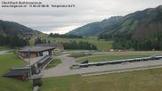 Archived webcam image showing Obertilliach biathlon centre on 12 Jun 2026 at 08:02