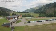Archived webcam image showing Obertilliach biathlon centre on 12 Jun 2026 at 16:02