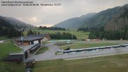 Archived webcam image showing Obertilliach biathlon centre on 30 Jun 2026 at 06:42