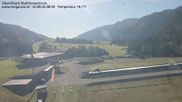 Archived webcam image showing Obertilliach biathlon centre on 26 Aug 2026 at 08:34
