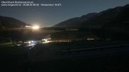Archived webcam image showing Obertilliach biathlon centre on 26 Aug 2026 at 00:34
