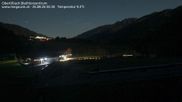 Archived webcam image showing Obertilliach biathlon centre on 26 Aug 2026 at 02:34