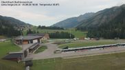 Archived webcam image showing Obertilliach biathlon centre on 26 Aug 2026 at 18:34