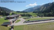Archived webcam image showing Obertilliach biathlon centre on 26 Aug 2026 at 12:34