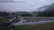 Archived webcam image showing Obertilliach biathlon centre on 18 Sep 2026 at 06:07
