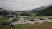 Archived webcam image showing Obertilliach biathlon centre on 18 Sep 2026 at 07:07