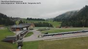 Archived webcam image showing Obertilliach biathlon centre on 18 Sep 2026 at 08:07