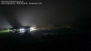 Archived webcam image showing Obertilliach biathlon centre on 18 Sep 2026 at 00:07