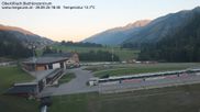 Archived webcam image showing Obertilliach biathlon centre on 28 Sep 2026 at 18:51