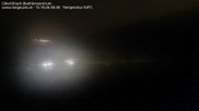 Archived webcam image showing Obertilliach biathlon centre on 15 Oct 2026 at 04:10