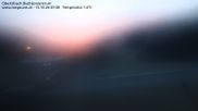 Archived webcam image showing Obertilliach biathlon centre on 15 Oct 2026 at 07:10