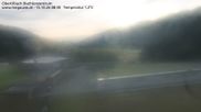 Archived webcam image showing Obertilliach biathlon centre on 15 Oct 2026 at 08:10