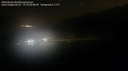 Archived webcam image showing Obertilliach biathlon centre on 15 Oct 2026 at 00:10