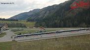 Archived webcam image showing Obertilliach biathlon centre on 15 Oct 2026 at 10:10