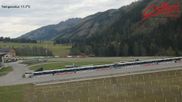 Archived webcam image showing Obertilliach biathlon centre on 15 Oct 2026 at 12:10