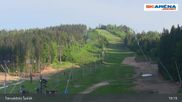 Archived webcam image showing The top of Tanvaldský Špičák on 22 May 2026 at 19:30