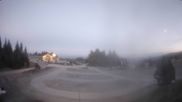 Archived webcam image showing Parking lot, skiresort Hochrindl on 18 Oct 2026 at 18:57