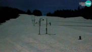 Archived webcam image showing Maribor: Postela Chair Lift Base Station on 26 Feb 2026 at 18:13